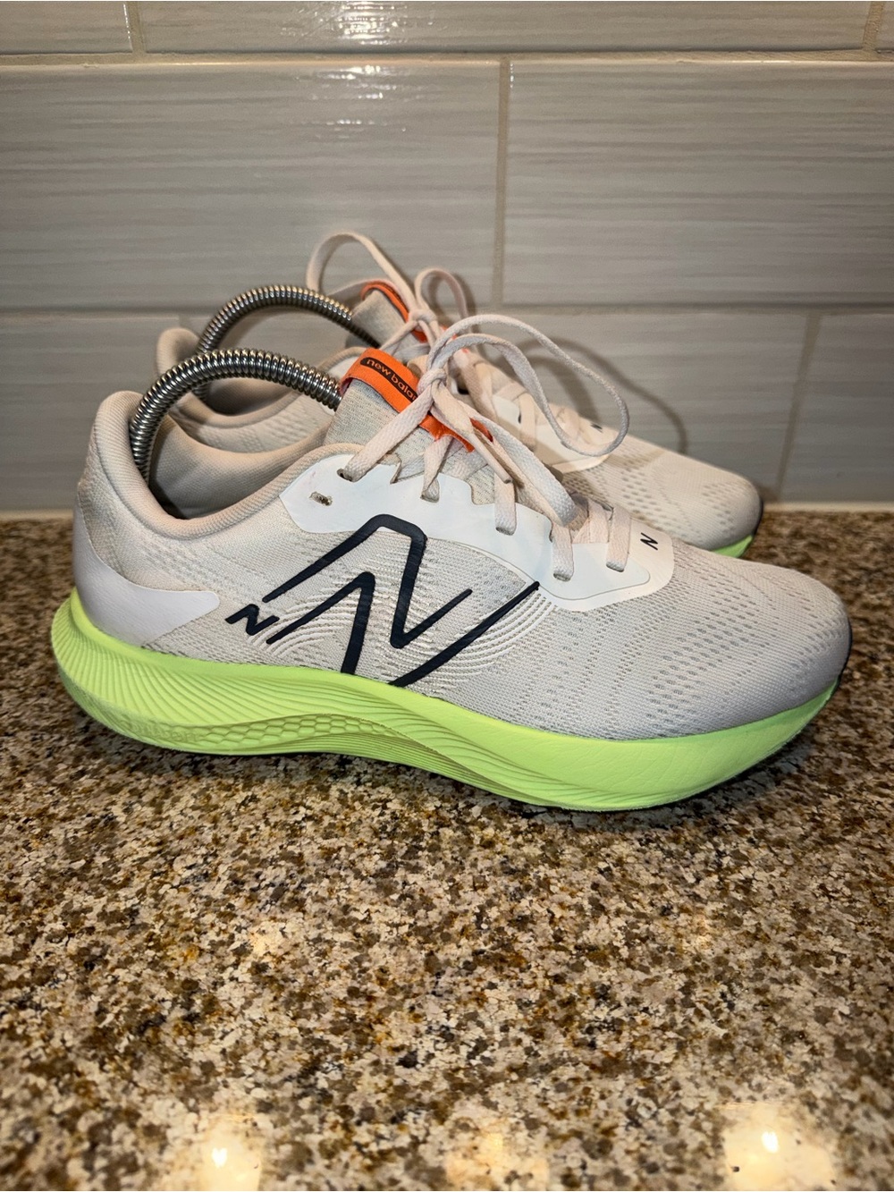 New Balance White Running Shoes with Neon Green Sole and Navy Logo